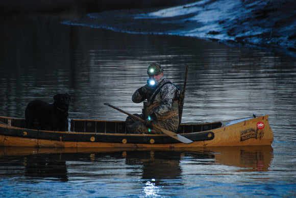 canoe fishing with headlamp and flashlight